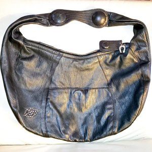 Betsy Johnson leather hobo bag with zipper.